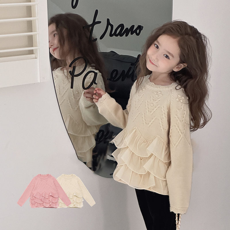 女の子のニットは底をつけてレースの洋気の王女の外で上着のレースの秋冬のセーターの子供服を着ます。