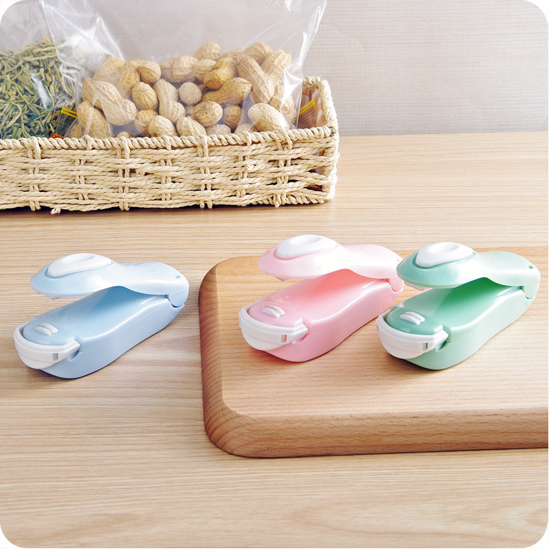 Presión de la mano mini máquina de sellado portátil máquina de sellado de calor máquina de sellado dispositivo de sellado de bolsas de alimentos snack clip de sellado de bolsas de plástico