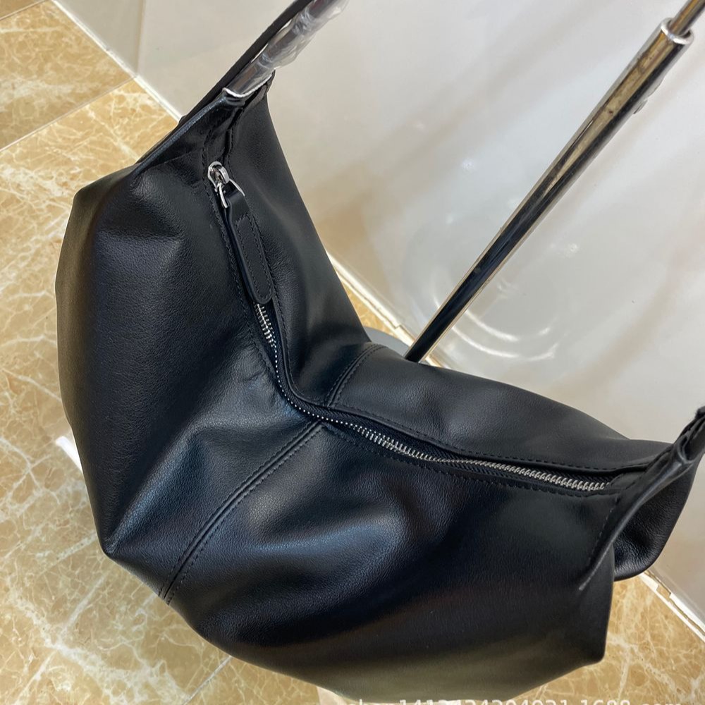 Nuevo bolso de albóndigas de piel blanda de moda de gran capacidad diseño de nicho casual retro bolso plegable de cuero de hombro único mujer