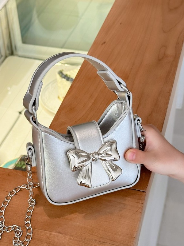 Bolso para niños 2024 nuevo estilo color caramelo arco mini bolso para niñas cadena para padres e hijos bolso de mensajero sobre rojo