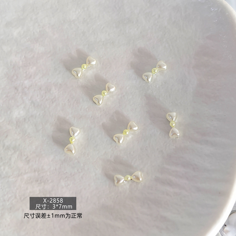 春日甜美简约日韩风珍珠蝴蝶结立体树脂美甲饰品爆款多色系指甲钻|undefined