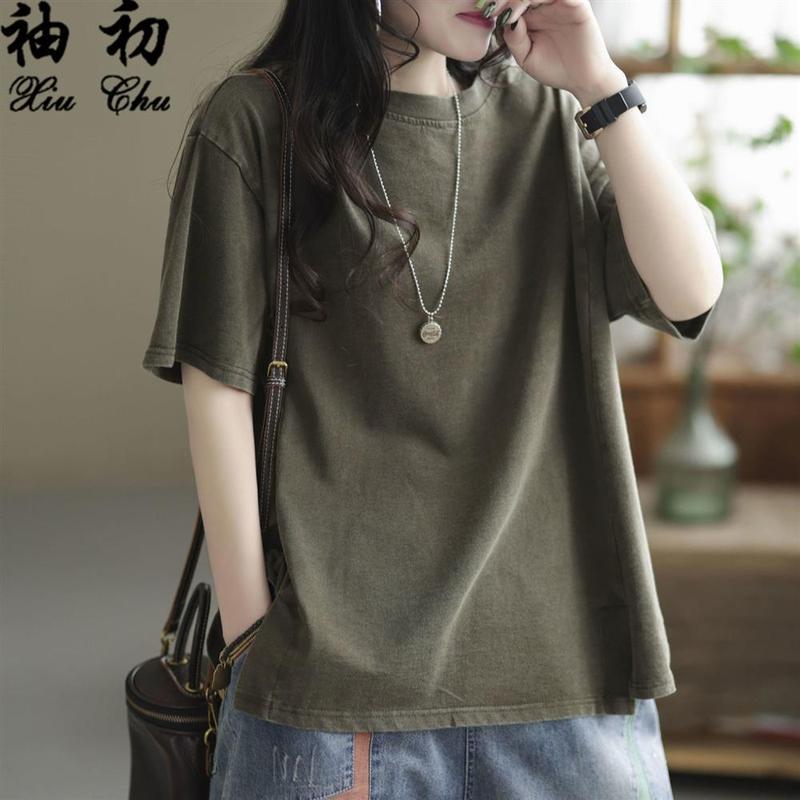 Tシャツの女性の夏服の新型半袖のゆったりとしたレトロな純色の百合はやせている服のtシャツの上着を見せます。|undefined