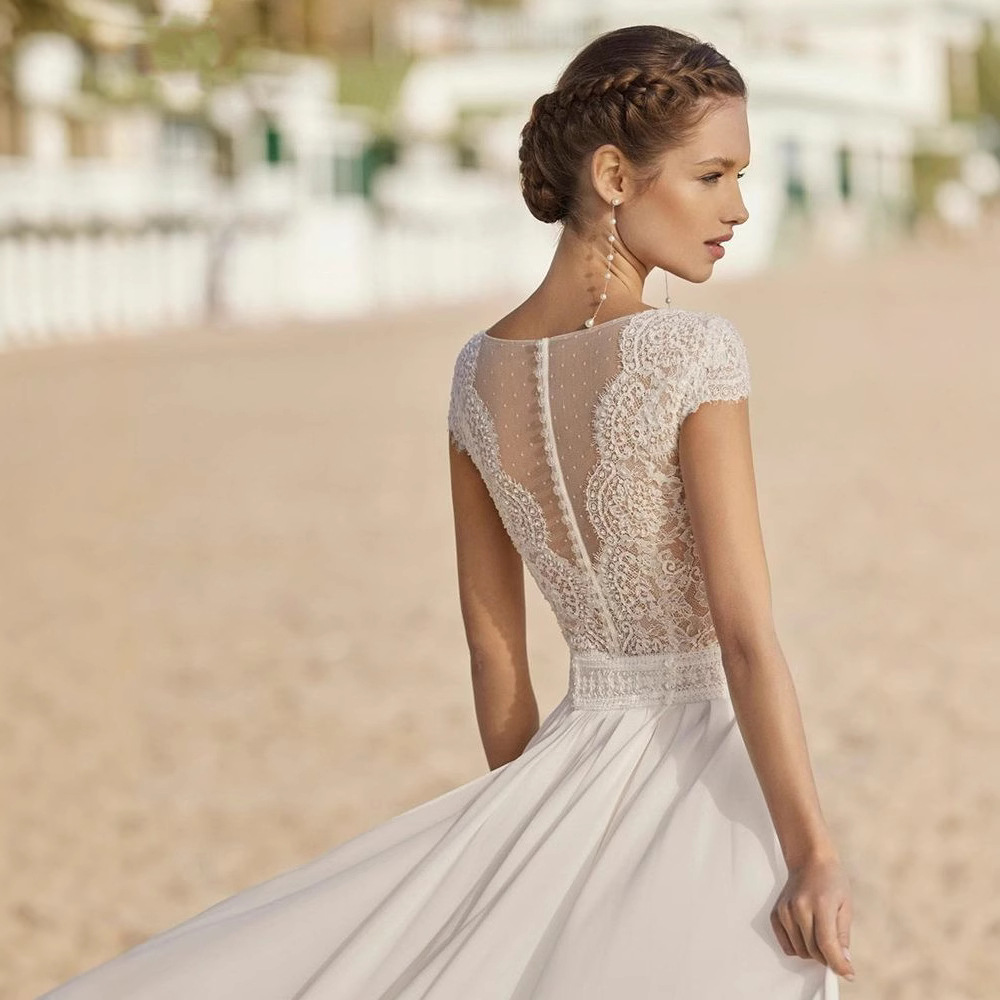Europa y América simple vestido de novia ligero 2025 nuevo paquete de hombro delgado gran espalda de la novia de cola para salir a la foto