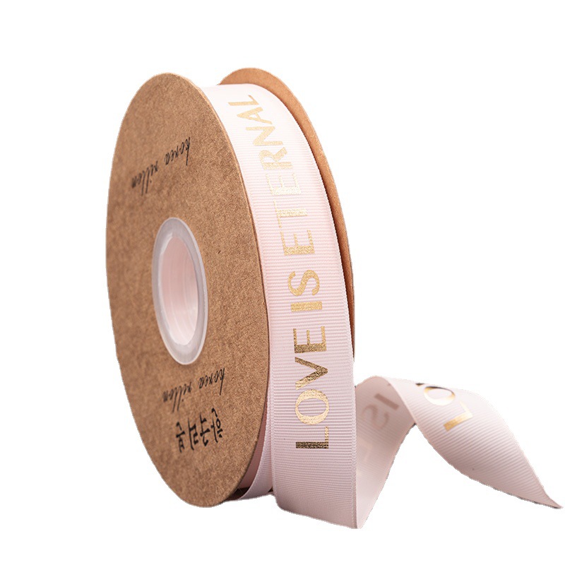 2,5 cm dorado cinta tienda de flores material de DIY floral al por mayor de la flor de poliéster Inglés carta envuelta cinta de la flor