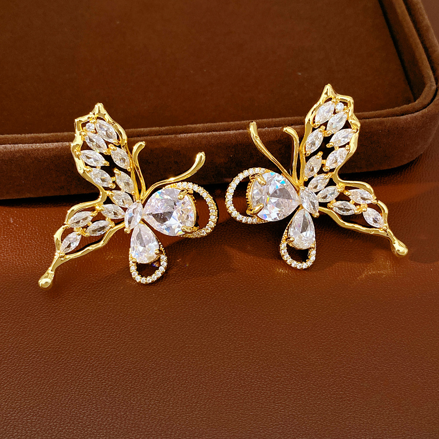 Oro verdadero electron-combustible mariposa de piedra pernos de orejas temperamento exquisito personalidad nicho pendientes ligero lujo conjunto de joyas de alta calidad