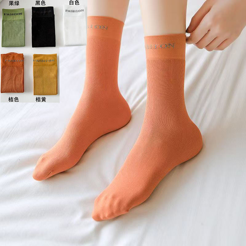 2025 nuevos calcetines de moda personales coreanos de color caramelo primavera y verano calcetines de algodón delgados versátiles calcetines de viento universitarios