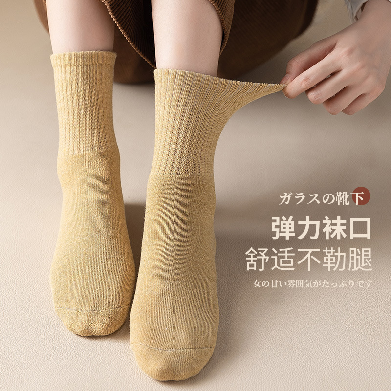 Calcetines de mujer de invierno forrado de lana gruesa caliente Terry Calcetines de piso de otoño e invierno de color sólido a media pantorrilla Zhuji calcetines al por mayor