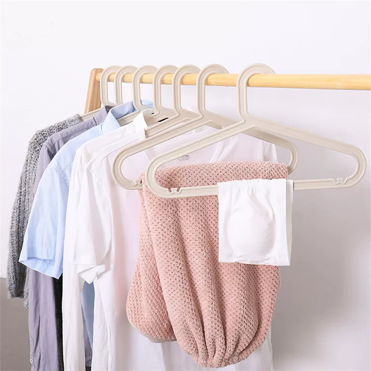 Plastic universal white hanger, lifting effect