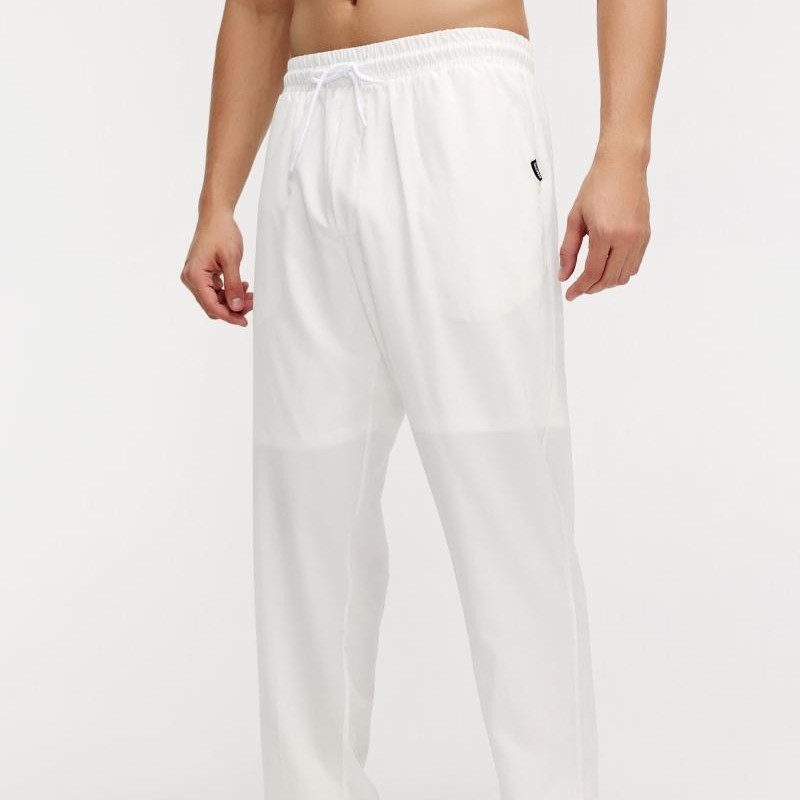 Primavera y verano de 2025 nuevos pantalones de carrera para hombres pantalones rectos de secado rápido sueltos pantalones deportivos casuales negros versátiles