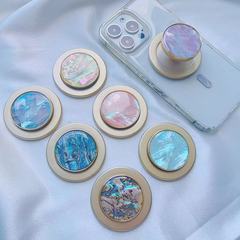 天然扇貝紋磁吸氣囊支架桌面便攜圓形貝殼金邊磁吸手機支架批發