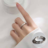 Retro fashionable ring, silver 925 sample, on index finger