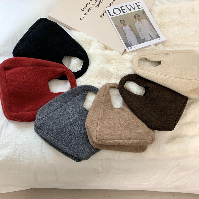Bolso de hombro 2025 nuevo otoño e invierno nuevo estilo coreano simple y versátil bolso de muñeca de punto de gran capacidad bolso