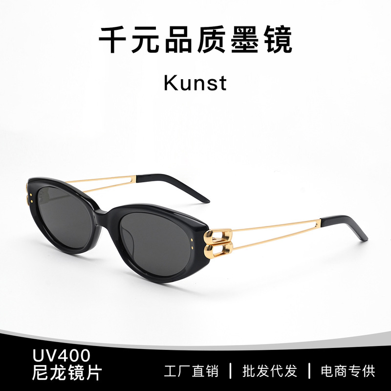 25 years new GM plate Kunst sunglasses Lin with cat's eye glasses metal hollow legs big face thin