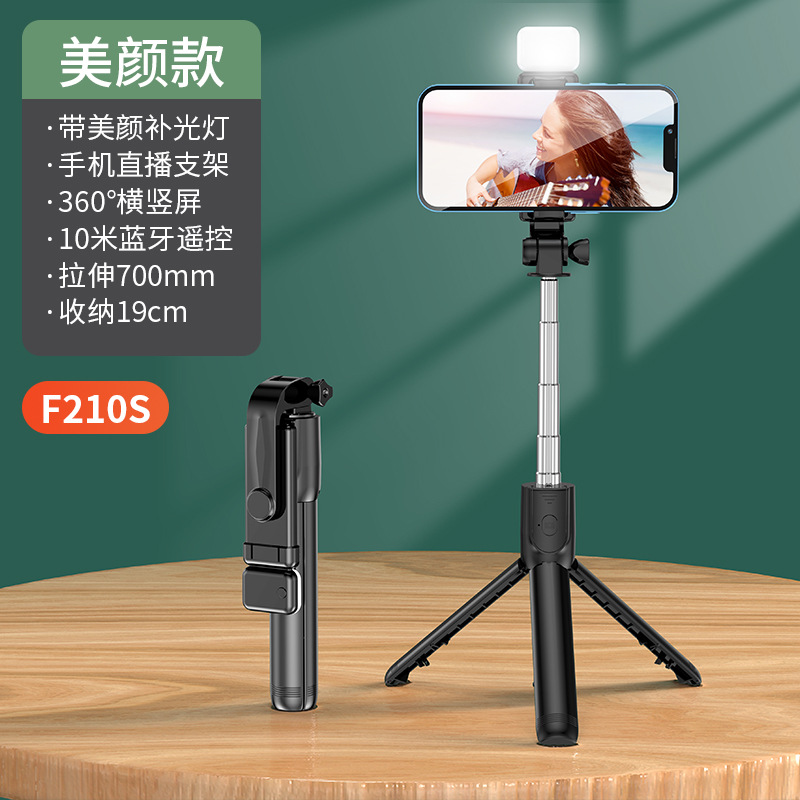 Ventas directas de fábrica teléfono móvil Bluetooth selfie stick trípode llenar luz selfie stick mini portátil de mano Cámara artefacto