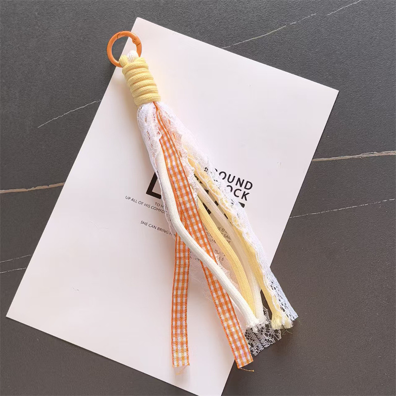 Accesorios de éxito en línea de teléfono móvil cordón de encaje de viento de dopamina accesorios bolsos llaveros colgantes al por mayor image 12