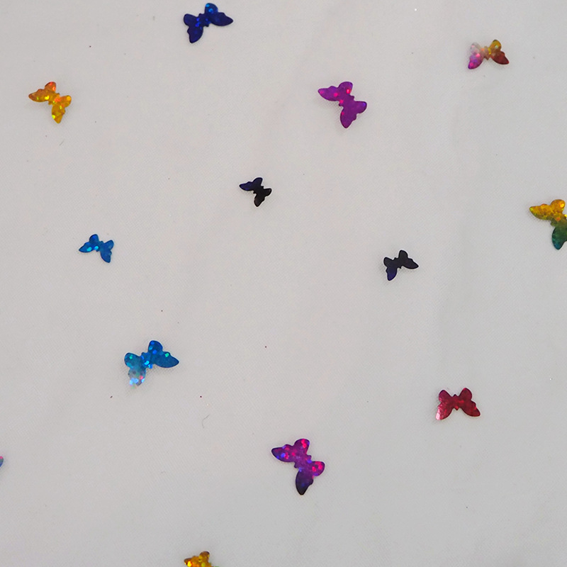 Fabricantes de mariposa colorida sequinilla tela de malla ropa infantil princesa vestido tela de malla ropa de rendimiento tela de malla en stock