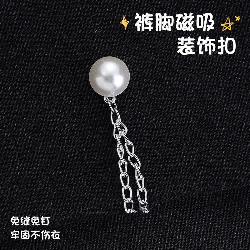 シャツの磁気ボタンの服は端を引っ張って固定します。|undefined