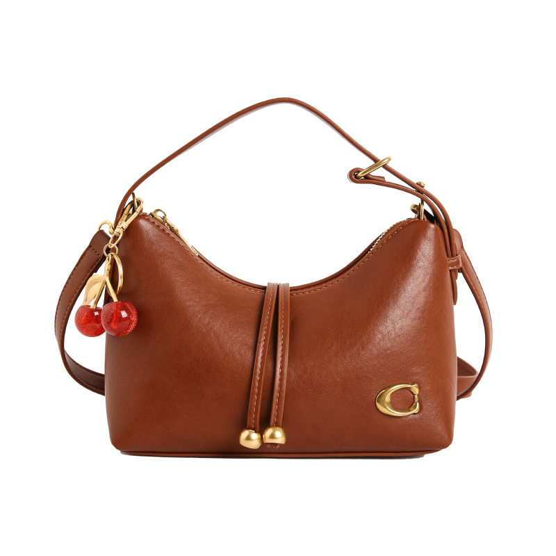 Bolso de mujer de moda de verano bolso de mano popular nicho coreano lujo ligero universal de alta calidad de viaje de hombro mochila