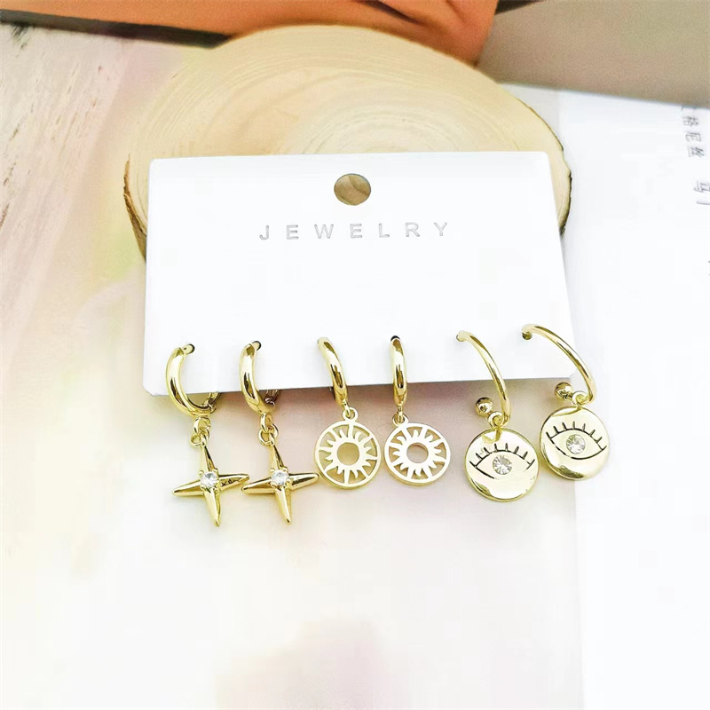 Retro Classic Style Star Smiley Face Butterfly Copper Inlay Zircon Earrings display picture 4