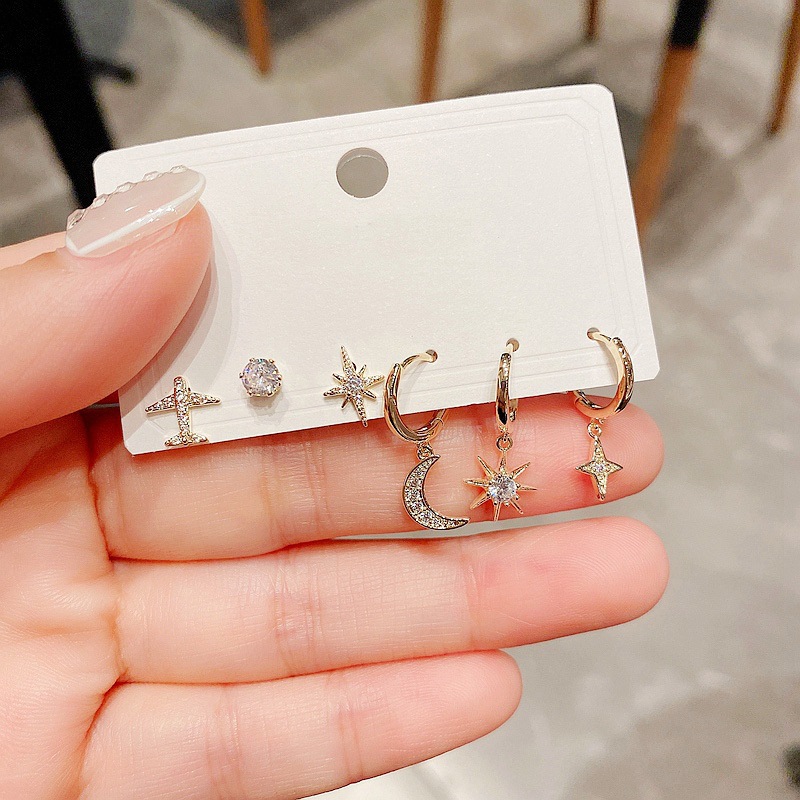 Wholesale Korean Zircon Micro-inlaid Small Plane Star Moon Copper Earrings Nihaojewelry display picture 9