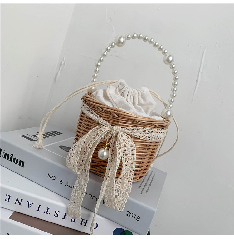 Fashion Round Straw Pearl Portable Bag display picture 15