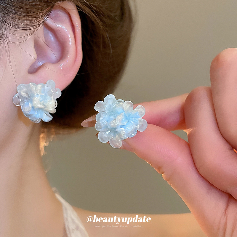 Pendientes de flores de súper hadas manchadas con agujas de plata Pendientes de todo fósforo de moda Personalidad femenina Pendientes de temperamento de lujo ligero Sensación de clase alta de nicho