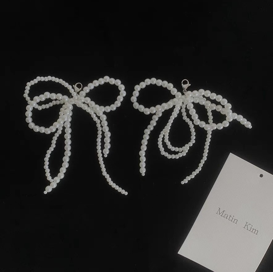 Artículo original de moda de verano arco perla botón de zapato colgante de cuentas zapatos zapatos adornamiento floral