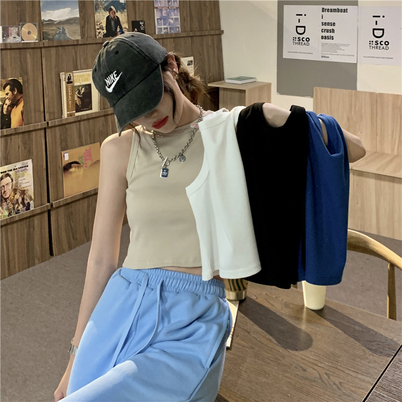 Top corto ajustado de cuello redondo estilo americano para exterior, camisola de verano 2025 nueva y moderna con un toque de diseño.