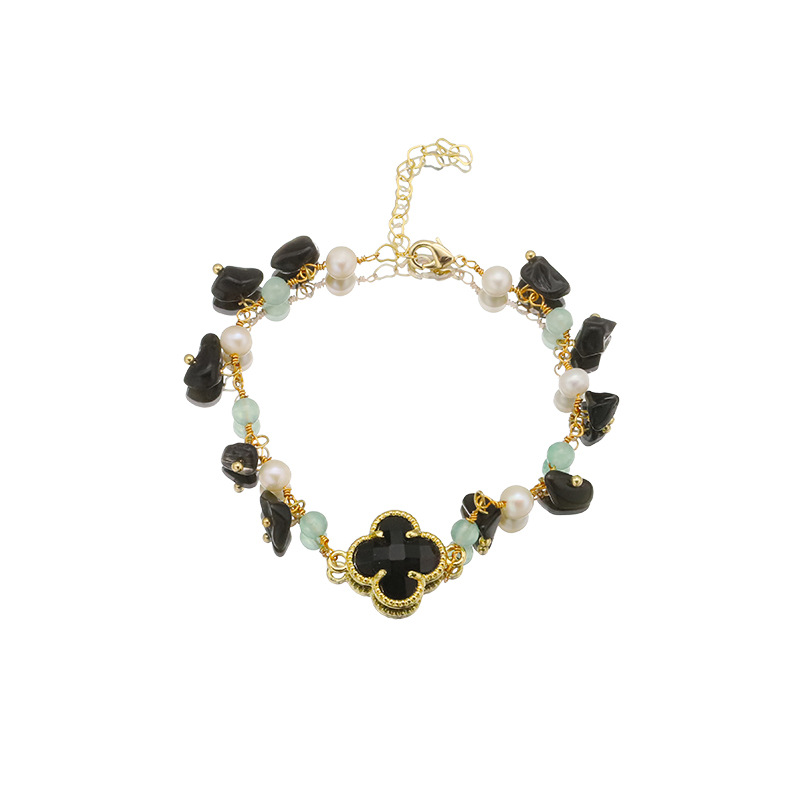 Pulseras de perlas de agua dulce naturales retro elegante pulseras de cuatro hojas negras europeas y estadounidenses el mismo joyería de empalme de oro 18k