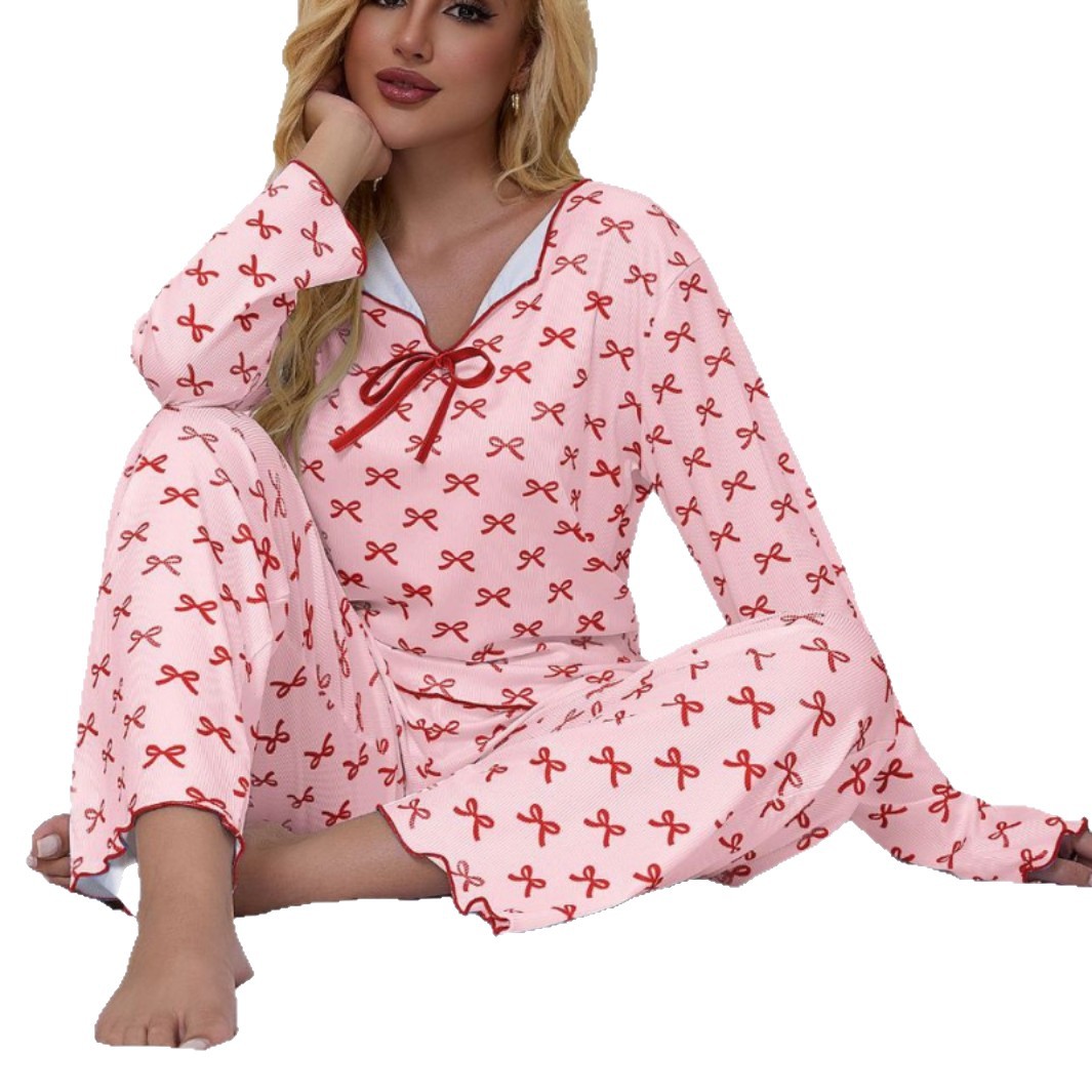 Nuevo otoño y invierno transfronterizos Europa y los Estados Unidos damas pequeñas solapas costillas agujeros arco pantalones de manga larga pijama conjunto de mujeres