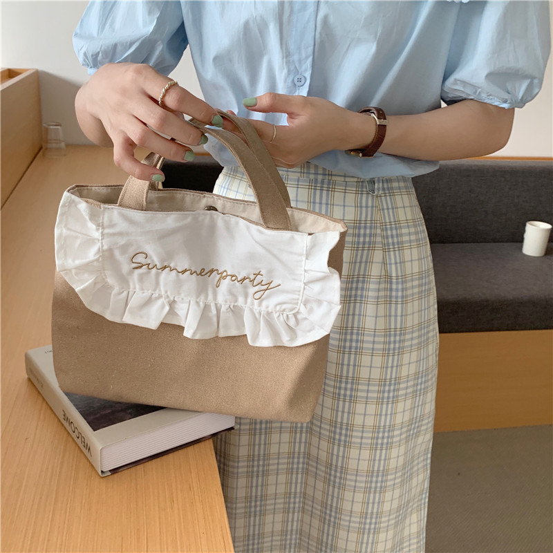 1441 Japanese and Korean chic Sweet ruffled bento Bag, Fresh embroidered hand-held small cloth bag, girl student bag wholesale undefined
