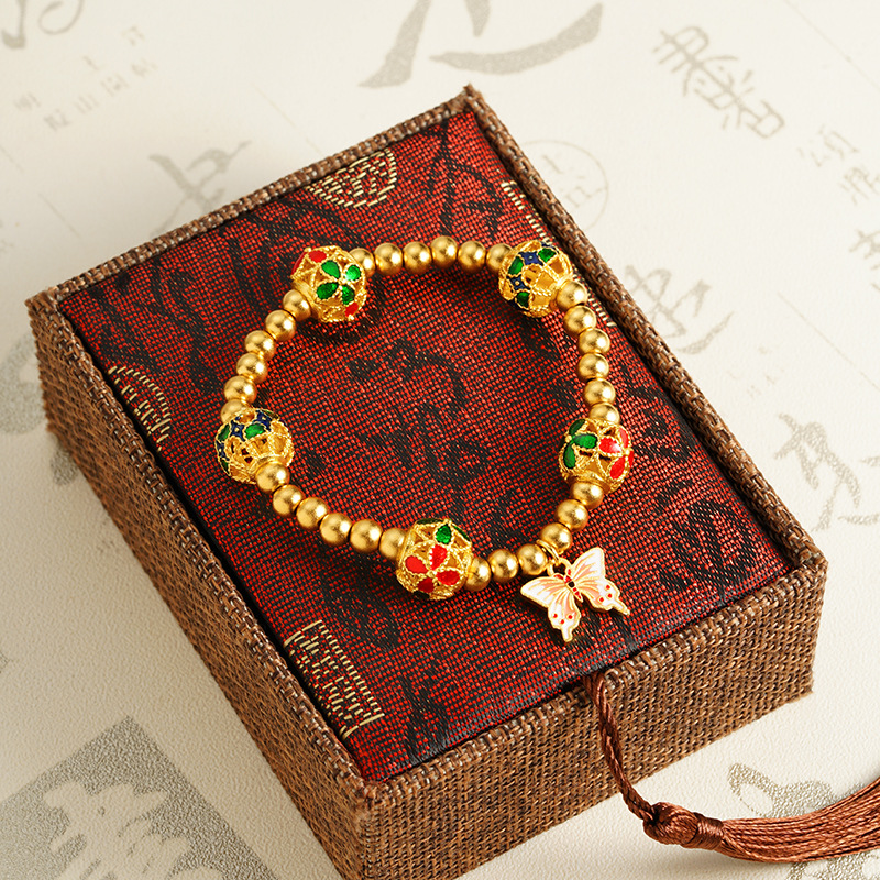 Vietnam oro de arena alta sensación de goteo de aceite esmalte hueco brazalete mariposa hortenida no se desvanecerá fabricantes al por mayor