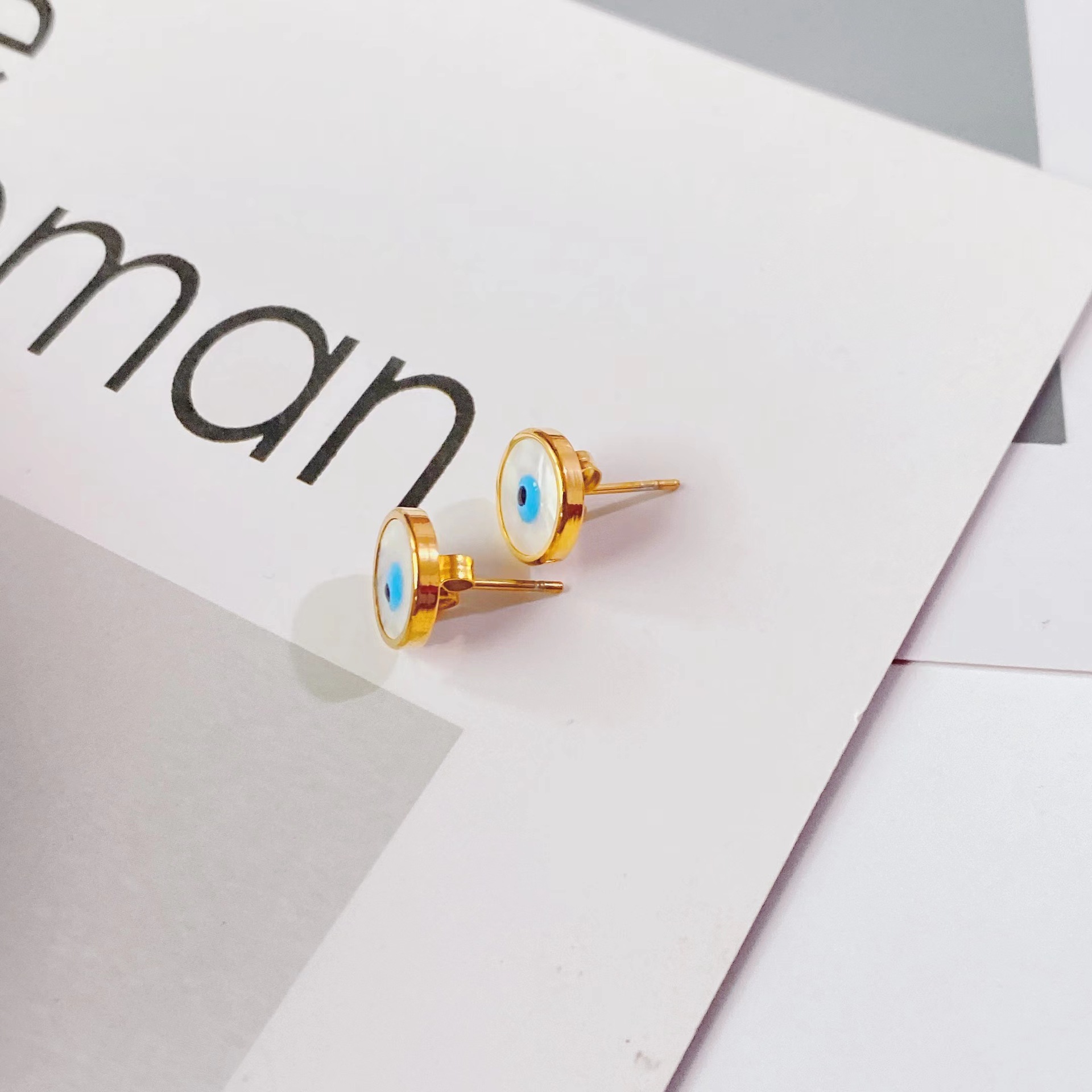 fashion trend new titanium steel gold simple eye shape earrings