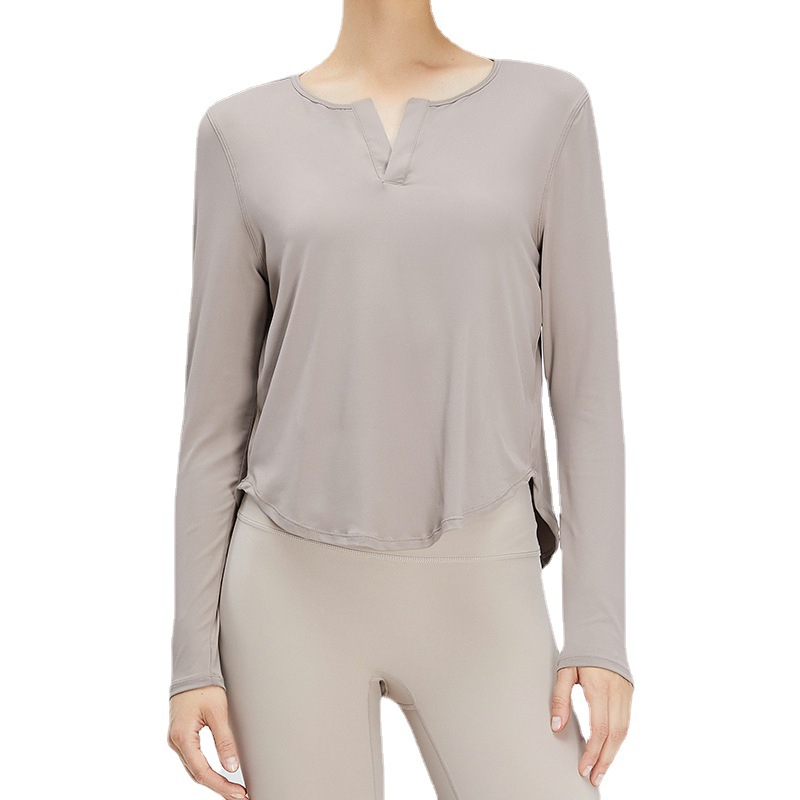 Camiseta de manga larga transpirable curvada de mujer de secado rápido fitness ropa de yoga