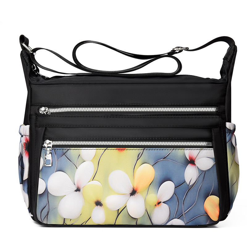 Bolso de hombro para mujeres de mediana edad bolso de la madre moda impresa casual tela de nylon de gran capacidad transfronteriza Venta caliente bolsa de mensajero para las mujeres