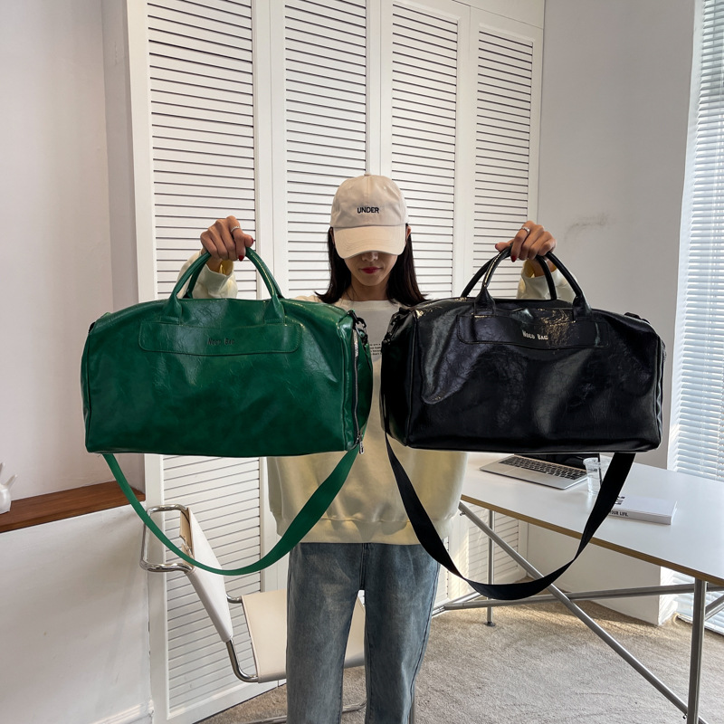 廠家批發新款韓版PU手提旅行包健身運動瑜伽包大容量短途行李袋