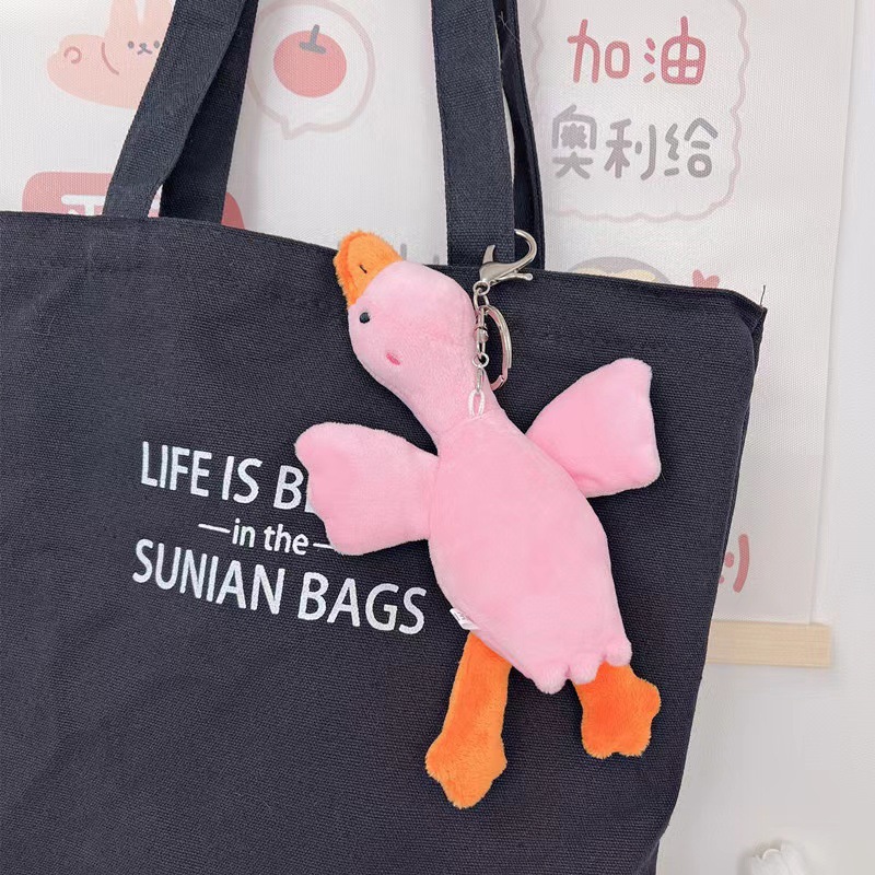 ぬいぐるみのかわいいアクセサリーのぬいぐるみのペンダント卸売りのおもちゃの子供のかばんの漫画の子供の鍵は子供の機械をつかみます。