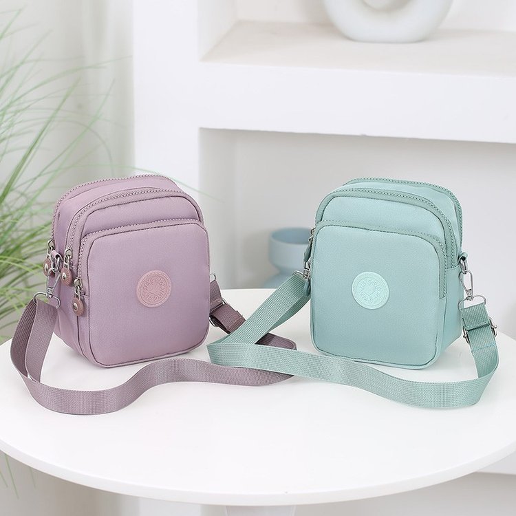 Bolso bandolera ligero bolso femenino 2024 nuevo estilo tela Oxford bolso cuadrado pequeño multicapa bolso pequeño de hombro para mujer textura versátil