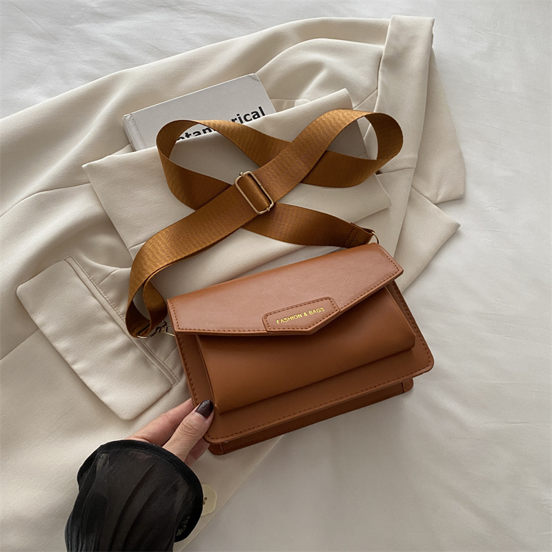 Calle casualidad de color sólido bolso de hombro 2024 nuevo tipo de bolso de mano casualidad nueva moda simple bolso de hombro