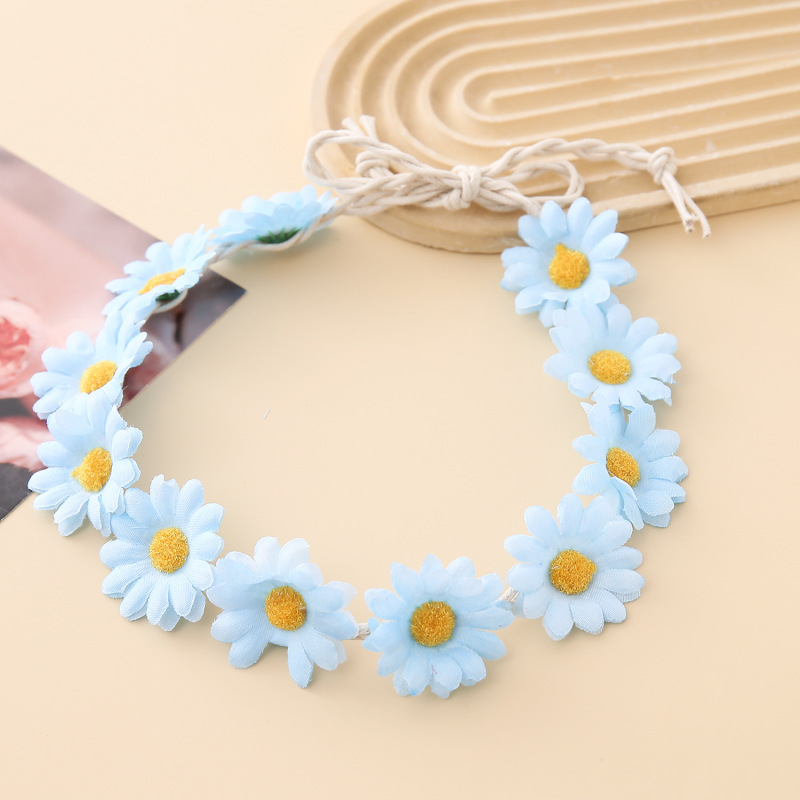 女性の女の子のヘアバンドは11輪の花の頭を編んで小さい太陽の花を持って旅行します。|undefined
