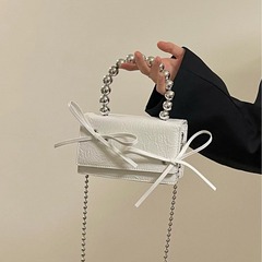 小眾設計包包女手提斜挎黑白蝴蝶結迷你鏈條包2024新款斜跨耳機包