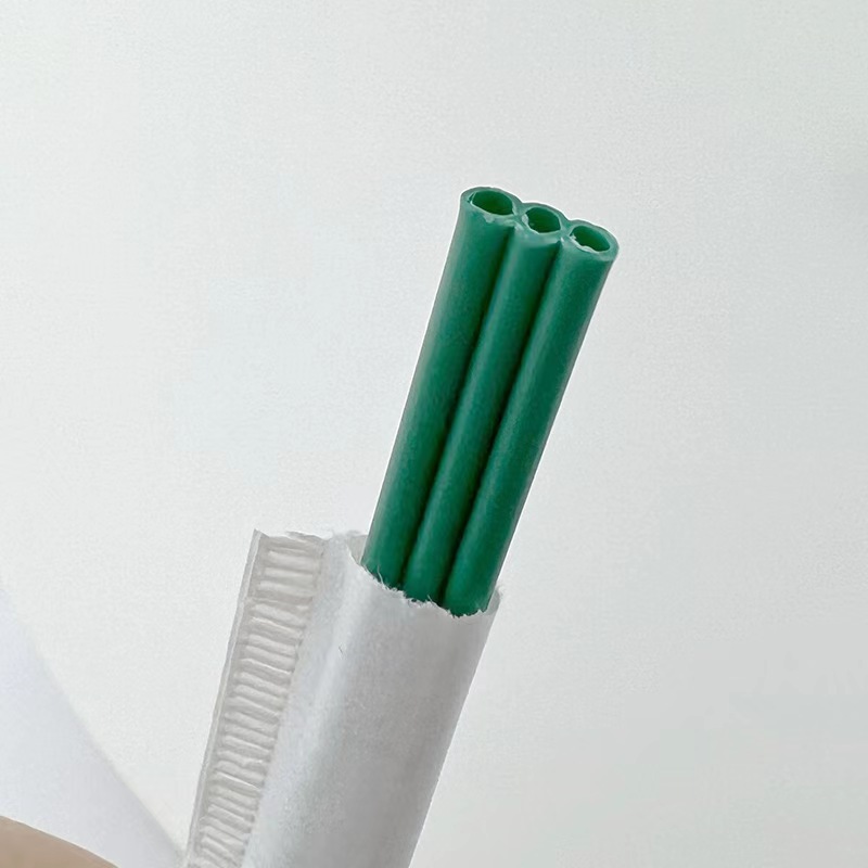 Paja de café desechable PLA degradable verde oscuro de tres agujeros boca plana de embalaje independiente barra de agitación de café 22cm