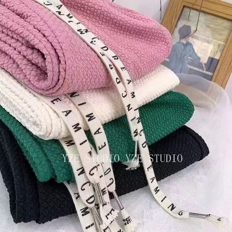 Mid-waist solid color waffle air puff pants casual pants women's spring new Korean style loose drawstring wide-leg pants fashion