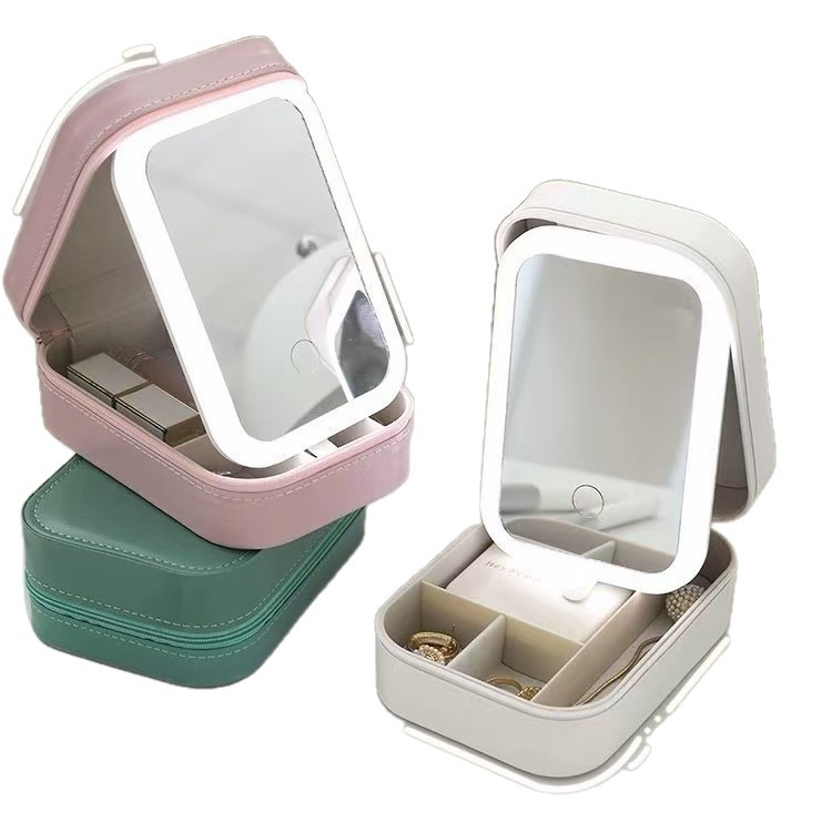 Bolsas de maquillaje de venta caliente de gran capacidad con espejo LED caja de almacenamiento de maquillaje de viaje portátil caja de almacenamiento de división de capas
