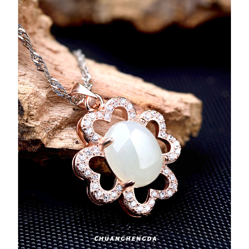 S925 plata y diamante de oro collar colgante de cuatro hojas colgante mujer al por mayor japonés y coreano pequeña cadena clavícula de temperamento fresco