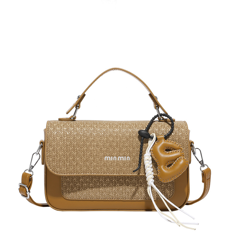 Textura al por mayor de lujo ligero bolso de mano bolso de mujer otoño 2025 nuevo estilo extranjero empalme bolso de hombro bolso de viaje