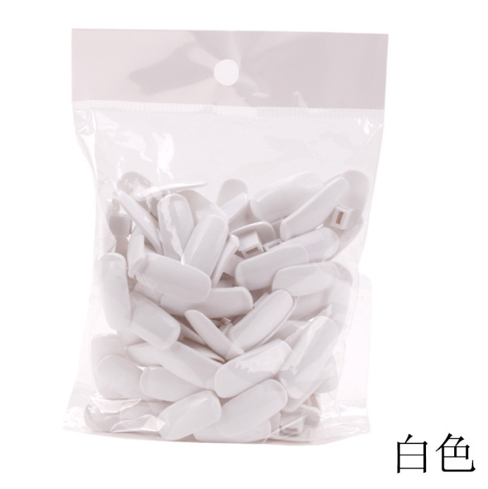 Manicura al por mayor conjunta flexible artificial mano a juego práctica clavo pieza bolsa móvil mano manipulador uñas pieza tres colores