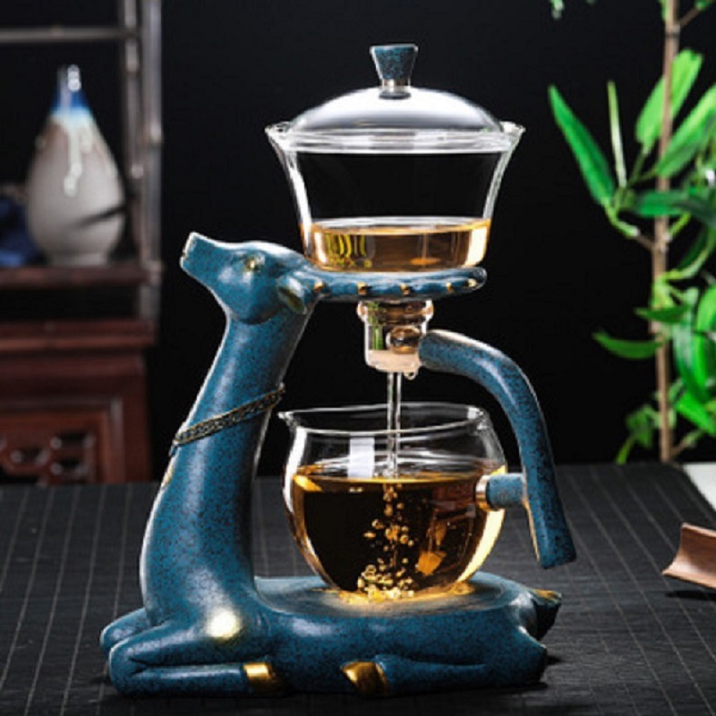 Fábrica al por mayor de vidrio perezoso juego de té automático traje hogar Kung Fu taza de té Fabricación de té de succión magnética ciervo Fabricación de té artefacto