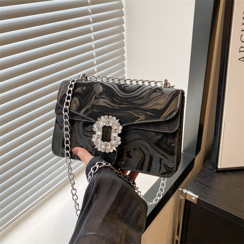 Moda simple temperamento coreano cadena de hombro bolso de mochila para mujeres 2024 primavera nueva bolsa de diamantes de estilo extranjero