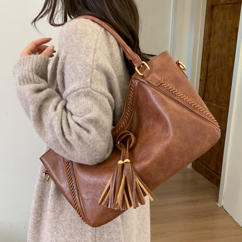 Bolsas de mujer transfronterizas de alto nivel, bolsas de borda de mano antiguas, bolsas de viaje cosidas a mano, bolsas de hombro casuales, bolsas axilales